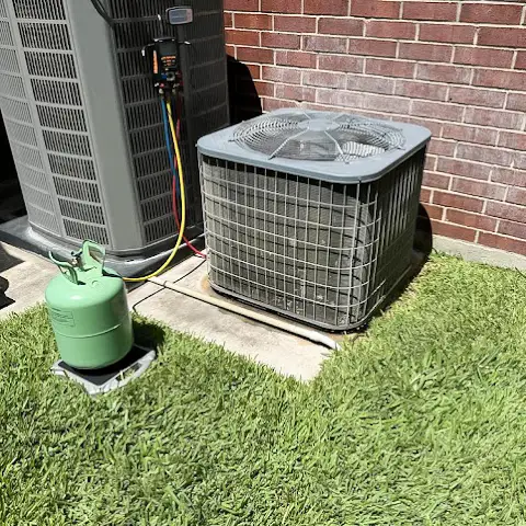 Repairing an older model air conditioner.